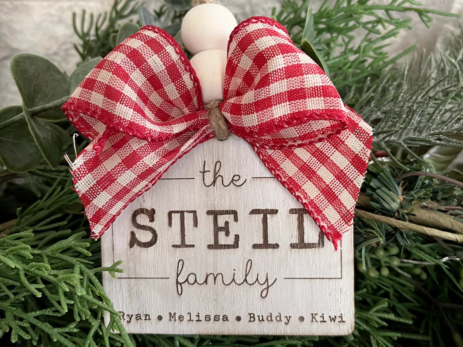 Laser engraved, wooden christmas ornament - Family name design.